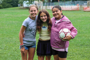 Summer Day Camp. young campers smiling.